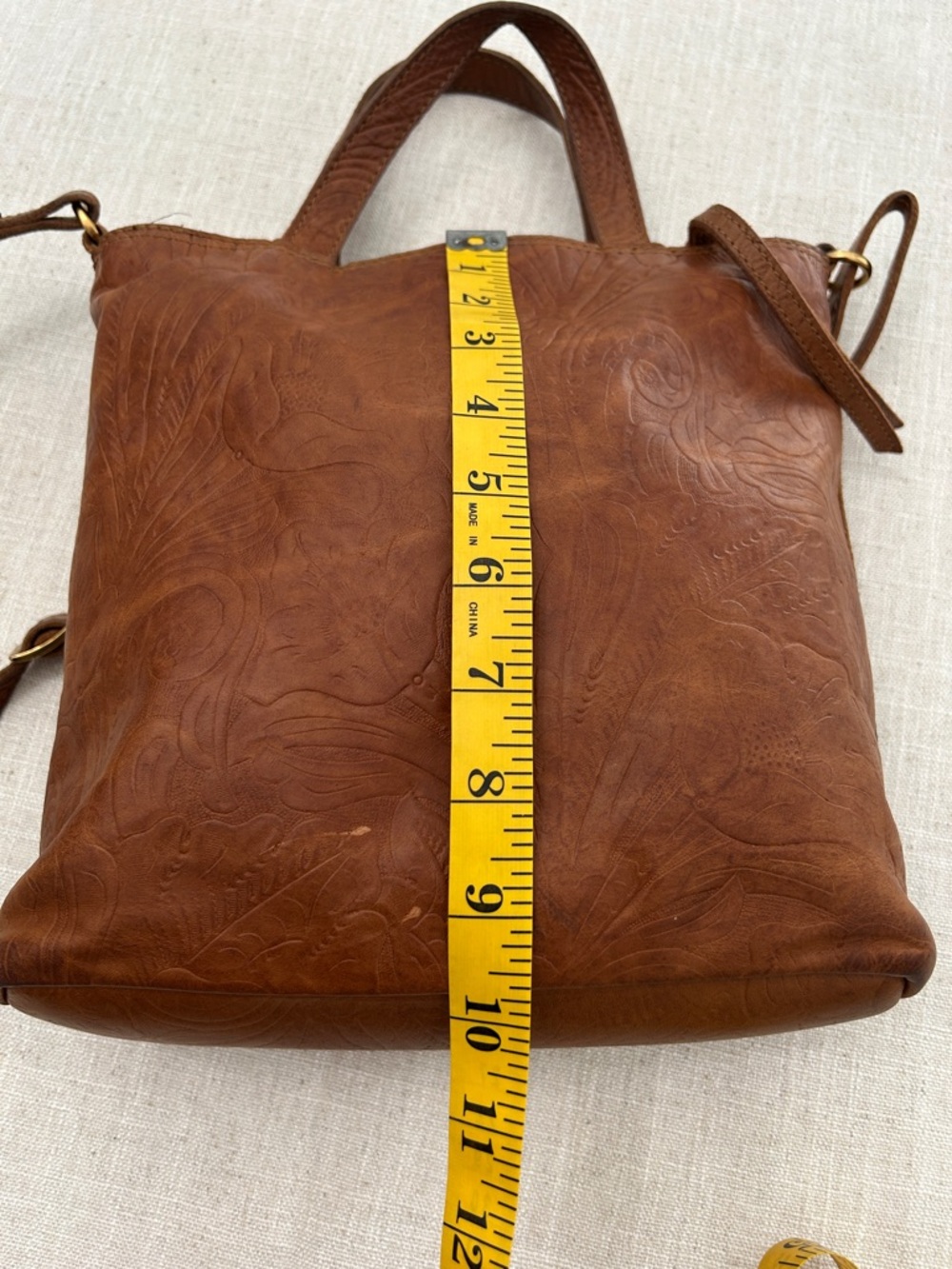 Margot Crossbody Bag Embossed Floral Leather in Cognac Brown - Picture 14 of 16